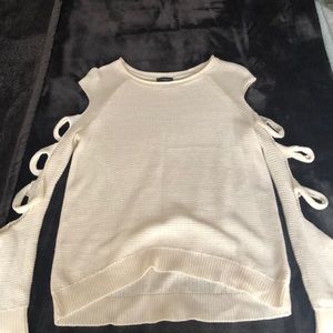 Sweater with cut out sleeves